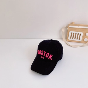Close-up of black cotton baseball cap featuring pink BOSTON 1630 embroidery detail