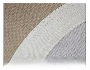 Détail du bandeau de sudation large et des coutures fines d'une casquette en sergé