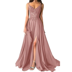 Detail of sequin lace bodice and high-slit chiffon skirt on dusty pink evening gown