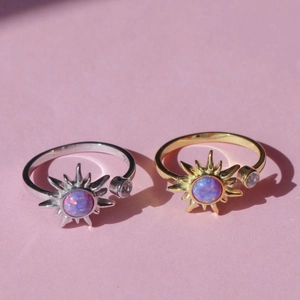Star-shaped opal ring in gold and silver finish with pavé cubic zirconia accents