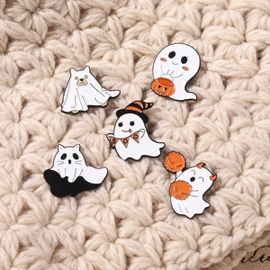 Ghost enamel brooch set with Halloween pumpkins and BOO flag on knit texture