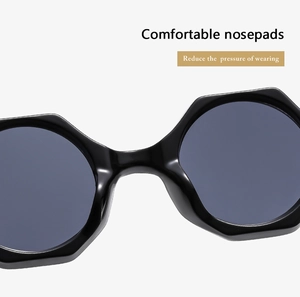 Detail view of comfortable nose pads on black hexagonal sunglasses to reduce pressure