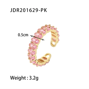 Detail view of gold open ring with pink oval cubic zirconia and 0.5cm width measurement