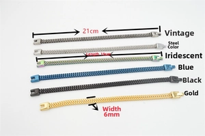 Detail of 6mm stainless steel woven bracelets in gold, blue, rainbow, and black finishes