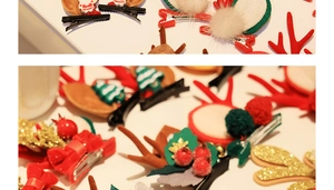 Detailed close-up of festive reindeer antler hair clips with soft mink fur and holiday decor