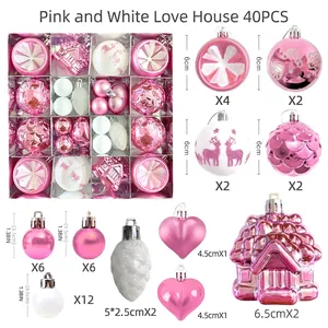 Detail of 40-piece pink and white Christmas ornament set with glitter balls and shapes