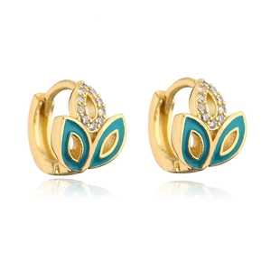 Macro shot of 18K gold plated leaf earrings with blue enamel and sparkling cubic zirconia