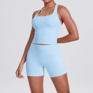 Close-up of light blue athletic shorts featuring a functional side phone pocket