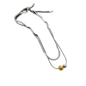 Double-layered snake chain necklace with gold and silver ball pendants in titanium steel