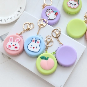 Cute round silicone coin purses with colorful cartoon animal patterns and gold keychains