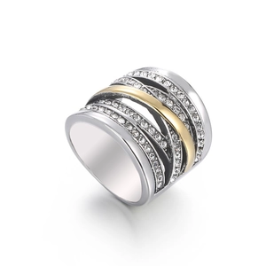 Bague large entrelacée en acier argenté et doré avec pavé de zircons étincelants