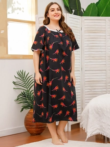 Detail of floral plus size nightgown with white lace trim and black bow accent