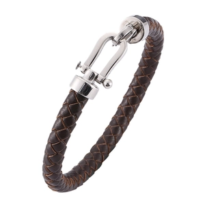 Braided brown leather bracelet for men featuring a polished silver horseshoe shackle clasp