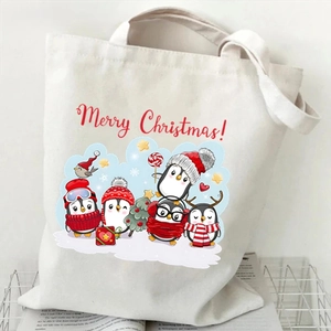 White canvas tote bag with Merry Christmas penguins print and holiday gnome design