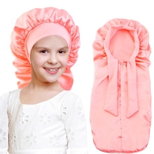 Pink satin sleep cap for kids with wide elastic band and long hair care design