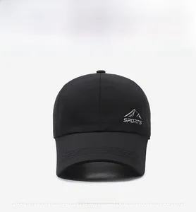 Front view of black baseball cap featuring silver mountain sports embroidery and curved brim