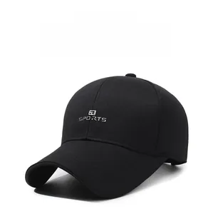 Detail of a black baseball cap featuring embroidered R SPORTS logo and breathable fabric