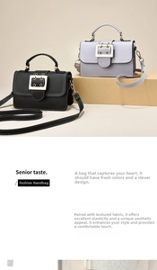 Detail showing litchi grain leather texture and metallic square buckle on handbag