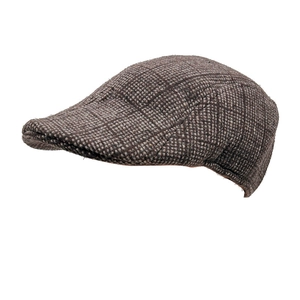 Classic British style tweed flat cap for men with a vintage brown plaid pattern
