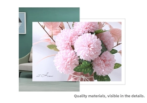 Detail of pink faux pompon chrysanthemum in ceramic vase for modern home decor