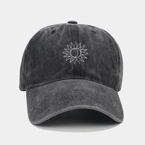 Detailed embroidery of sun and moon on vintage washed dark grey baseball cap