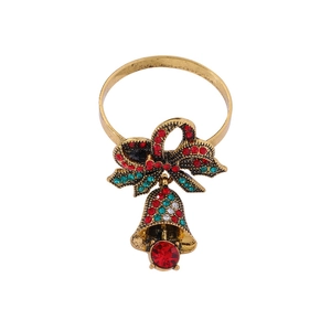 Christmas napkin ring with gold bow, colorful zircons, and bells on a white background