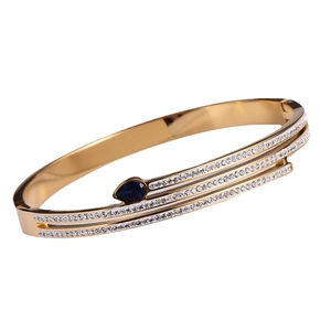 Elegant 18k gold-plated snake bangle with sparkling white zircon and blue drop gemstone