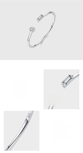 Detail showing S925 sterling silver stamp and micro-set zircon on the adjustable ring