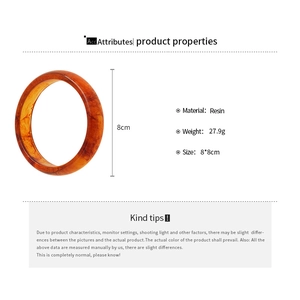 Detail view of amber resin round bangle showing 8cm outer diameter and 27.9g weight