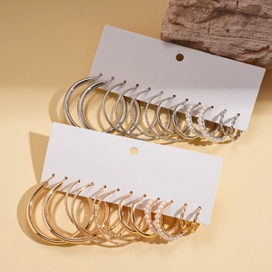 18-pair set of gold and silver pearl hoop earrings in diverse geometric textures