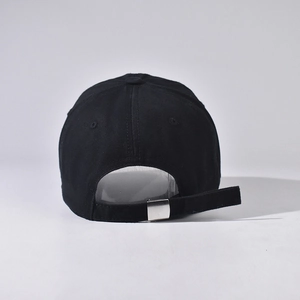 Detail view of cotton baseball cap featuring adjustable metal buckle and twill texture