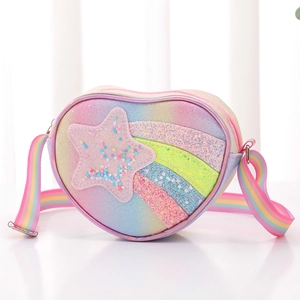 Glittery heart-shaped rainbow crossbody bag with star pattern and striped shoulder strap