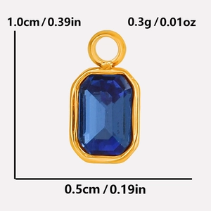 Macro detail of gold stainless steel blue gemstone pendant with size measurements