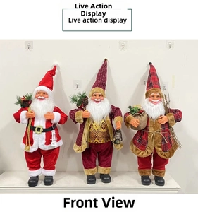 Detailed view of three Santa Claus dolls in classic red, gold, and plaid holiday outfits