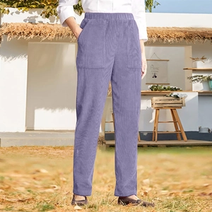 Detailed texture of purple corduroy high-waisted straight trousers with side pockets