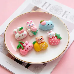 Cute DIY resin accessories featuring rabbits and fruits in a pink ceramic plate