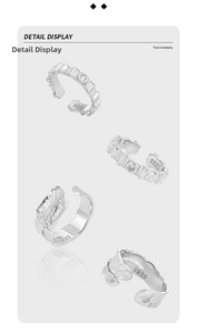 Detail of S925 sterling silver rings showing wave texture and feather design with cubic zirconia