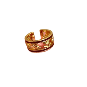 Luxurious gold plated open ring with red enamel details and hollow horse pattern design