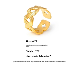 Detailed close-up of adjustable 18k gold plated stainless steel ring with woven texture