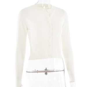 Detail of white slim-fit knit cardigan with round neck and ribbed hem on a mannequin