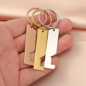 Minimalist house-shaped keychain bottle openers in rose gold, gold and silver finishes