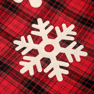 Red and black buffalo plaid Christmas tree skirt with white snowflake felt applique