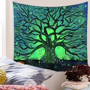 Detail of life tree tapestry hanging on a bedroom wall with green and blue gradient colors