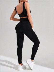 Damen Yoga-Set in Schwarz mit Sport-BH und hoch taillierter Leggings nahtlos