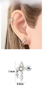 Detail showing cross earrings with opal stone and screw back design, height 1.4cm