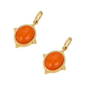 Oval orange natural stone pendants with gold plating on a clean white background
