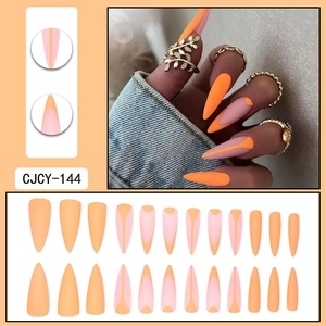 Long stiletto press-on nails in matte orange and pink French tip design, 20-piece set
