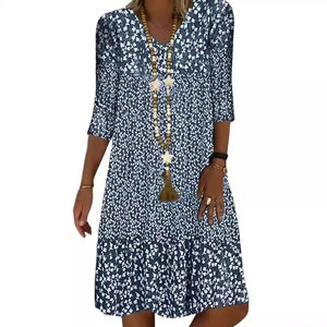 Floral V-neck midi dress in navy blue with white print, tiered skirt and three-quarter sleeves