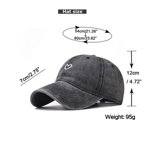 Detailed size guide for heart embroidered baseball cap showing 54-60cm circumference and weight