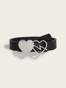 Detail shot of black faux leather belt with silver double heart buckle and lightning bolt